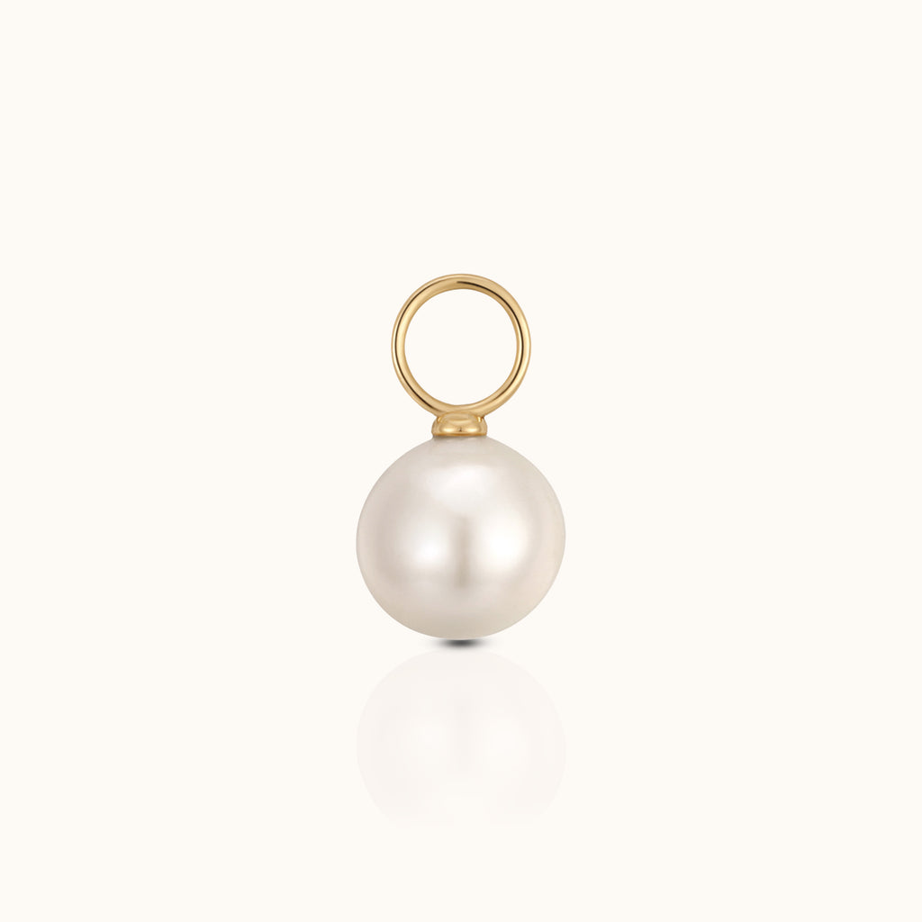 DOVIANA 14K solid gold ear charm with a classic round 6 to 6.5mm white pearl and polished gold connector ring