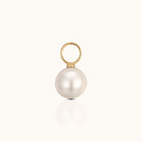 DOVIANA 14K solid gold ear charm with a classic round 6 to 6.5mm white pearl and polished gold connector ring