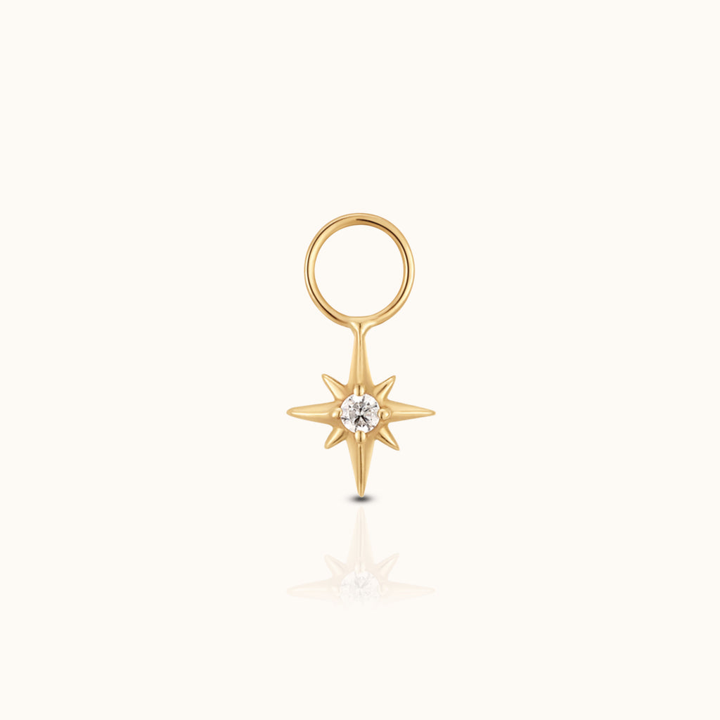 DOVIANA 14K solid gold North Star ear charm with a round lab-grown diamond set in a polished celestial starburst design
