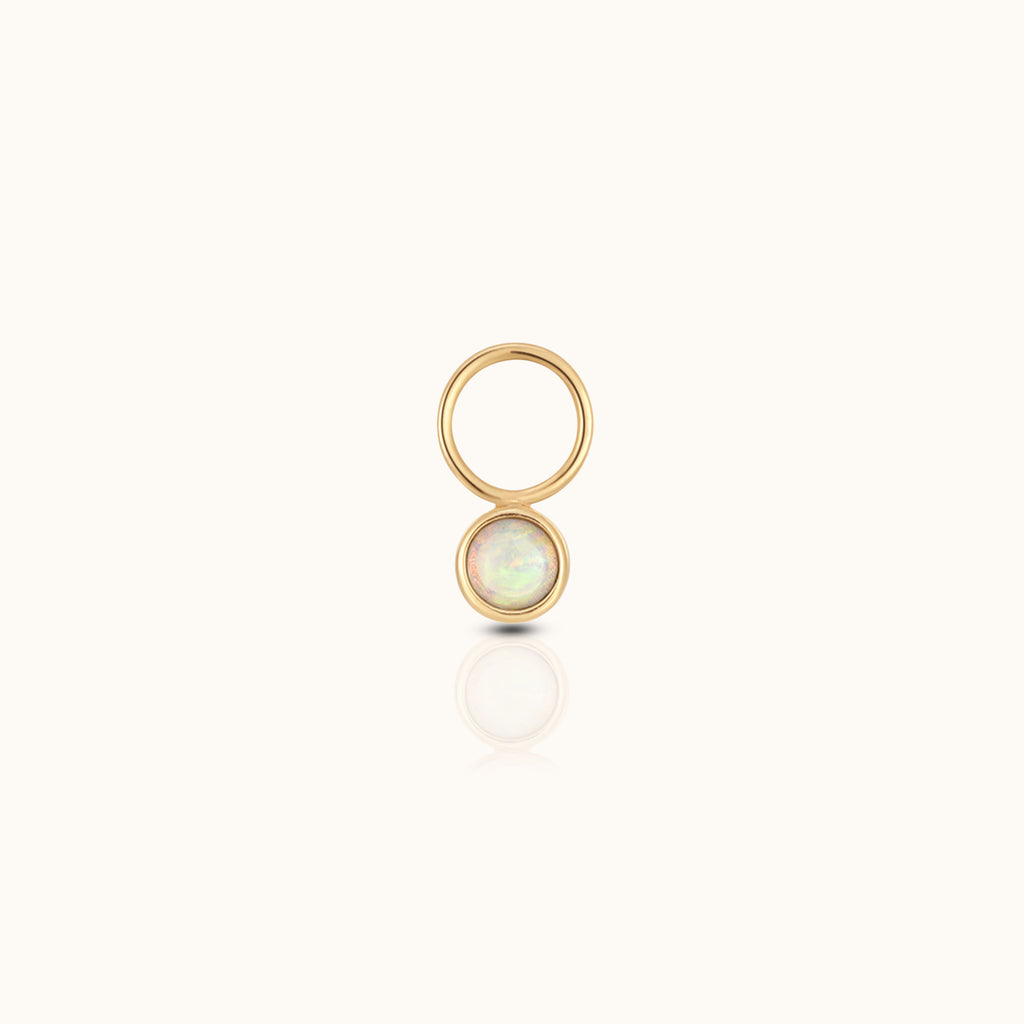 DOVIANA 14K solid gold ear charm with a round iridescent opal gemstone in a smooth polished bezel setting