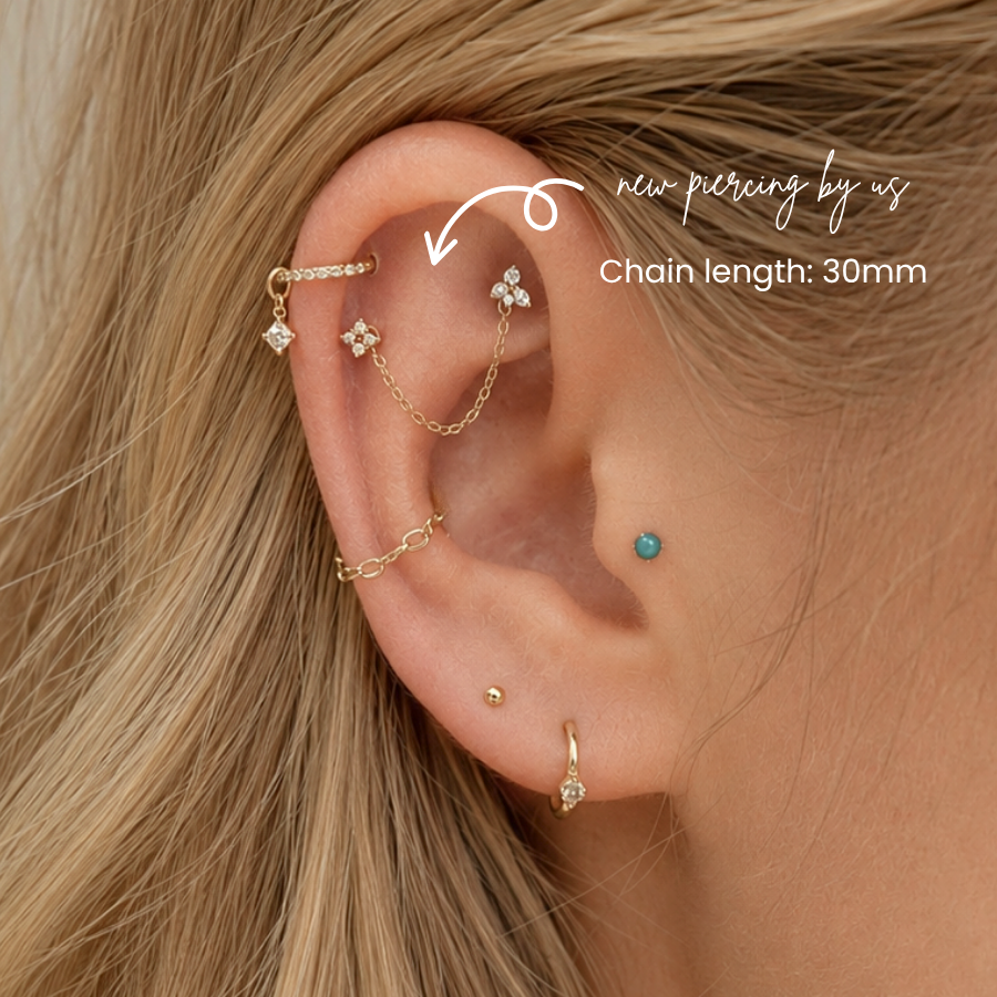 DOVIANA NYC 14K Solid Stud Connector Chain in 30mm styled in a curated ear piercing with gold chain jewelry, cartilage studs, turquoise flat back, and minimalist fine piercing jewelry in New York.