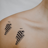 Checkerboard Bolt – Bold Energy with a Retro Twist by DOVIANA Tattoo Studio (height 0.6‘’) 