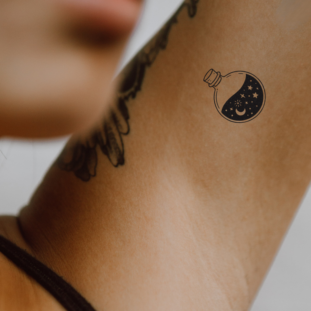 Cosmic Potion — A Bottle Full of Stars by DOVIANA Tattoo Studio (width 0.5‘’)