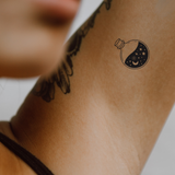 Cosmic Potion — A Bottle Full of Stars by DOVIANA Tattoo Studio (width 0.5‘’)