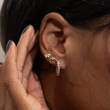 Two Tone Gold and Silver CZ Bezel Set Huggie Hoop Earrings by Doviana