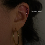 Double Helix Piercing in NYC | Expert Needle Piercing at DOVIANA