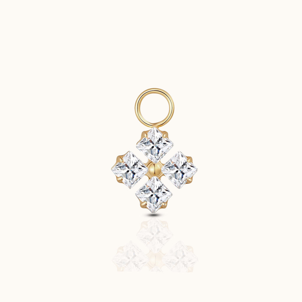 DOVIANA implant-grade titanium ear charm with four princess-cut clear CZ stones arranged in a geometric cluster with an 18K PVD gold finish.