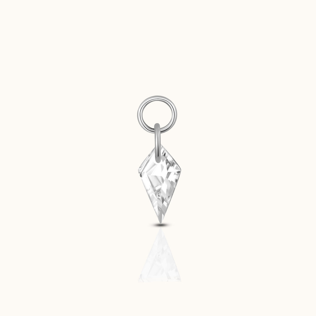 DOVIANA implant-grade titanium ear charm with a faceted kite-cut clear CZ and polished silver-tone connector rings.