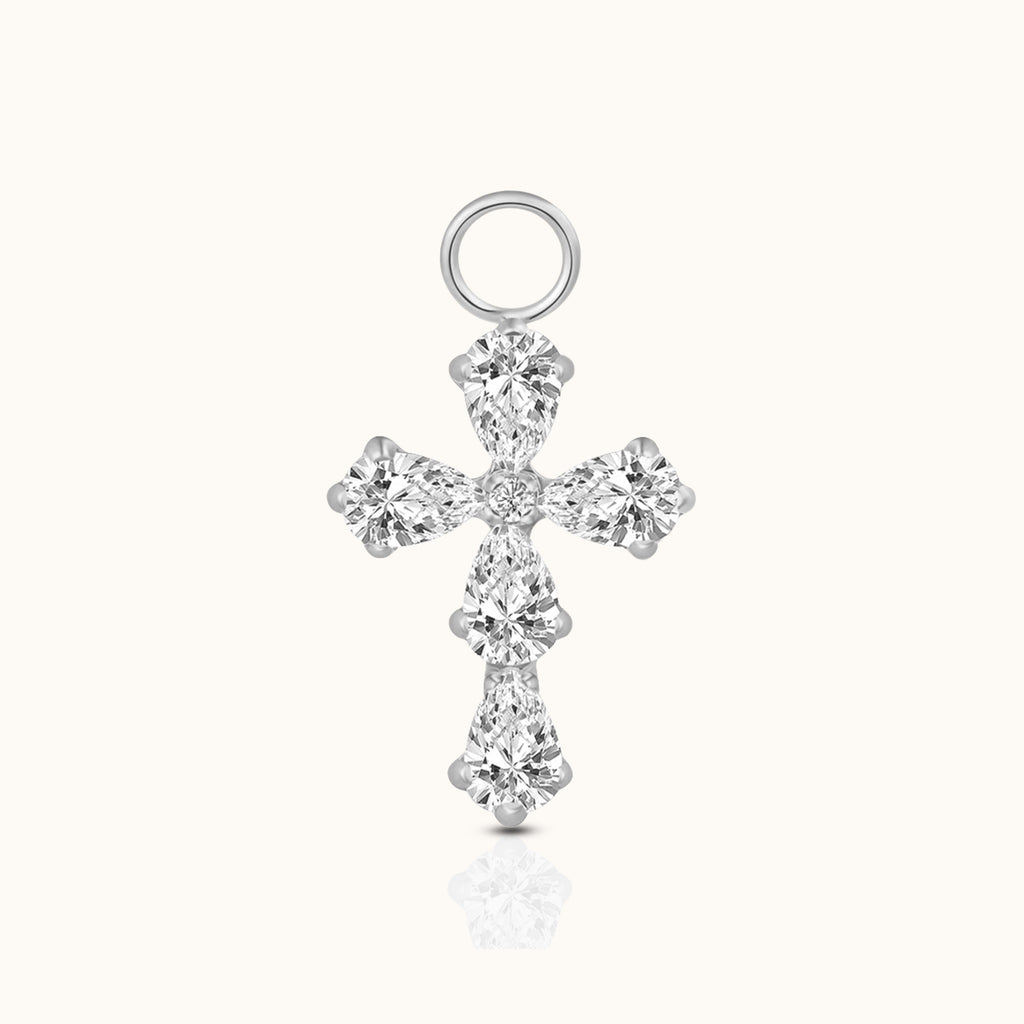 DOVIANA implant-grade titanium cross ear charm with five pear-cut clear CZ stones, a round CZ center, and a polished silver-tone finish.