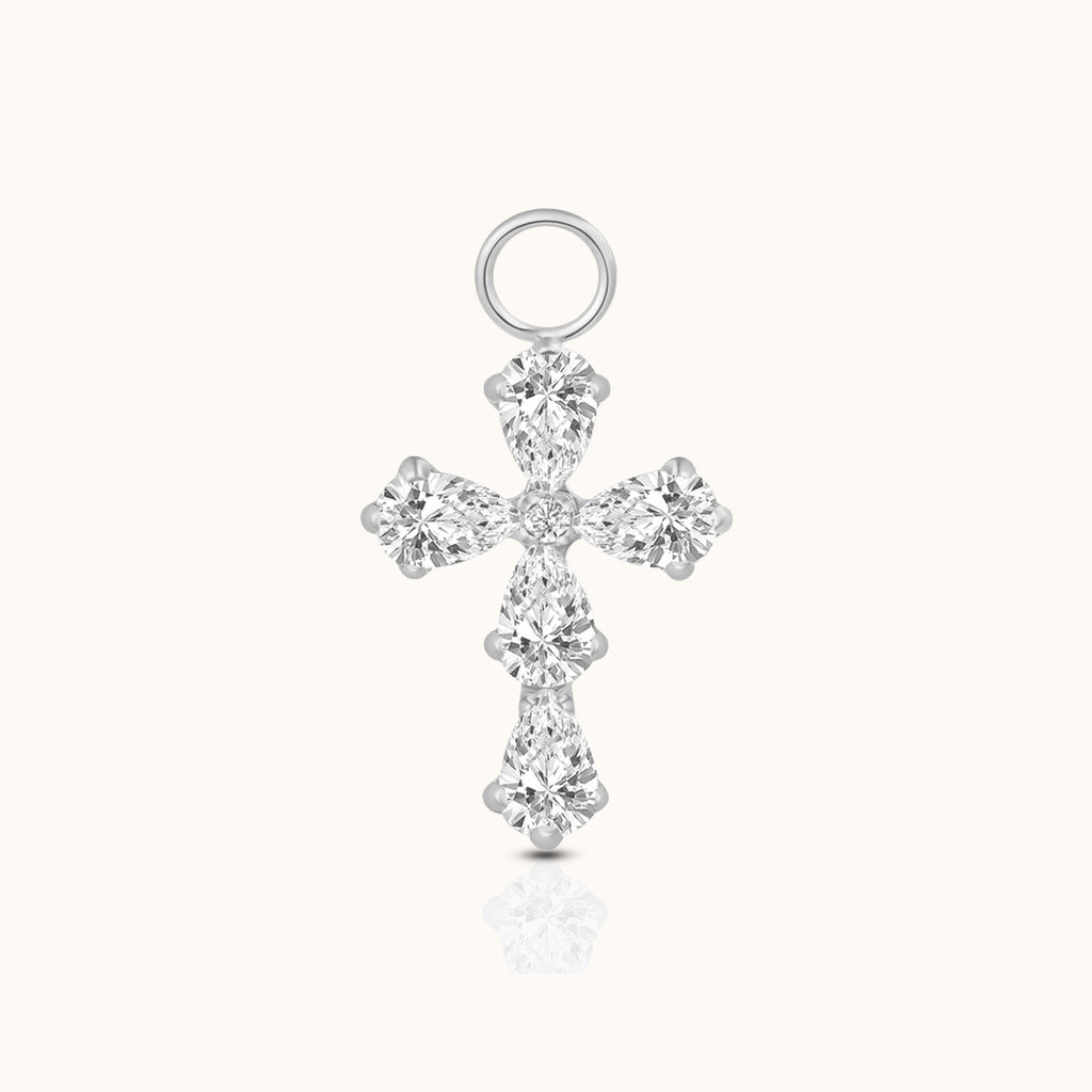 DOVIANA implant-grade titanium cross ear charm with five pear-cut clear CZ stones, a round CZ center, and a polished silver-tone finish.