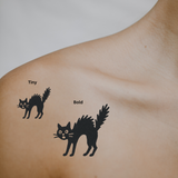 Spooked Kitty — Cute, Fierce, and a Little Extra by DOVIANA Tattoo Studio (width 0.6‘’)