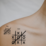 Tic Tac Whoop - You Always Win by DOVIANA Tattoo Studio (height 0.5‘’)