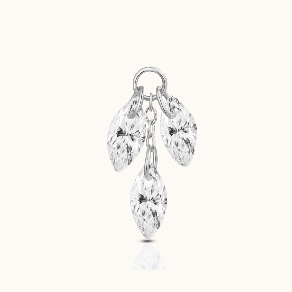 DOVIANA implant-grade titanium ear charm with three dangling marquise-cut clear CZ stones and polished silver-tone connector rings.