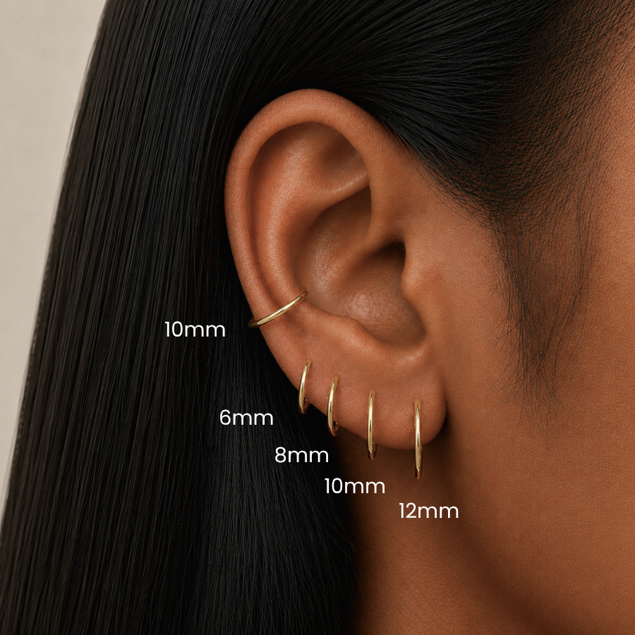 DOVIANA titanium pvd gold clicker hoop earrings size guide showing 6mm, 8mm, 10mm, and 12mm hinged hoops styled in lobe, upper lobes and conch piercings for cartilage and ear stack styling.