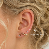 DOVIANA NYC 2mm flat back earring styled in a curated ear piercing with a baguette crawler earring, CZ lobe stud, and minimalist fine piercing jewelry for everyday ear stacks in New York.
