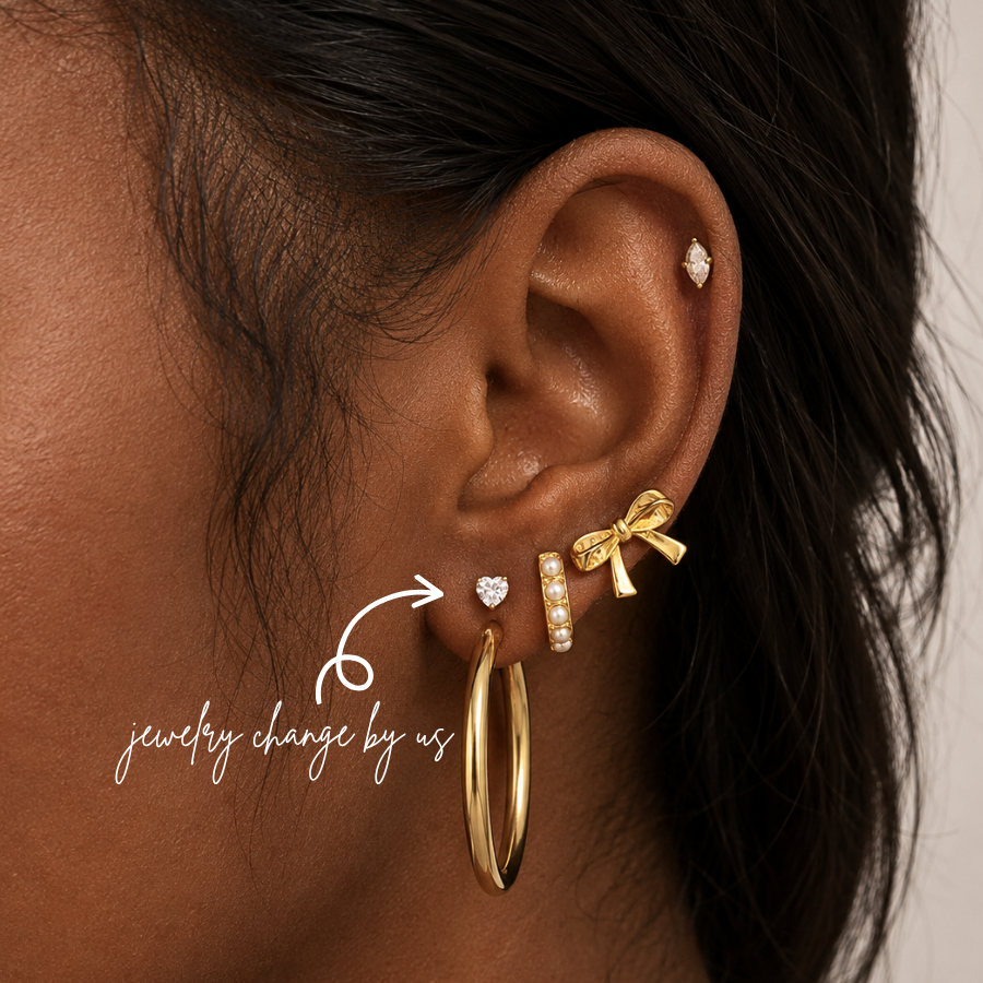 DOVIANA NYC heart flat back earring styled in a curated ear piercing with gold hoop, pearl huggie, bow earring, and minimalist gold piercing jewelry in New York.