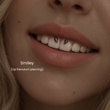 Close-up of smiley piercing also known as lip frenulum piercing with spike jewelry styled in an edgy minimalist body piercing aesthetic at DOVIANA NYC.