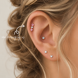 New helix piercing performed at DOVIANA NYC, a professional piercing studio in New York City specializing in cartilage piercings, implant-grade titanium jewelry, and personalized ear styling.