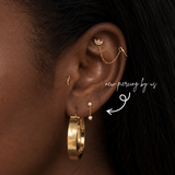 DOVIANA NYC pearl dangle flat back earring styled in a curated ear piercing with a gold hoop, crystal chain cartilage earring, and minimalist fine piercing jewelry in New York.